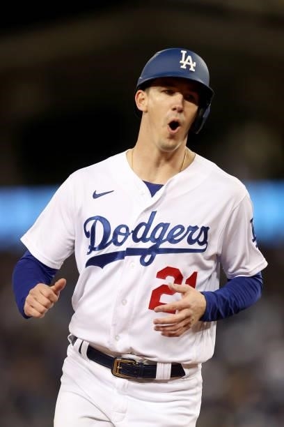 Walker Buehler of the Los Angeles Dodgers reacts after a two run home run by Mookie Betts against the San Francisco Giants during the fourth inningin...