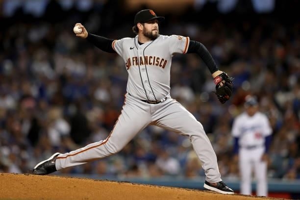 Dominic Leone of the San Francisco Giants pitches against the Los Angeles Dodgers during the fourth inning in game 4 of the National League Division...
