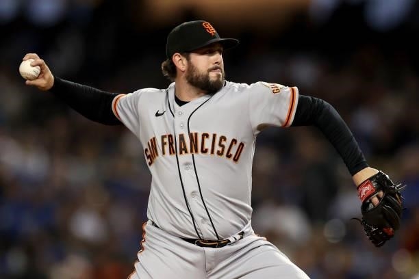 Dominic Leone of the San Francisco Giants pitches against the Los Angeles Dodgers during the fourth inning in game 4 of the National League Division...