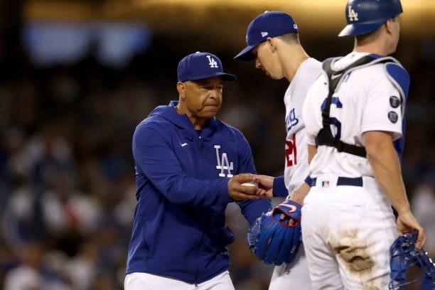 Manager Dave Roberts takes out Walker Buehler of the Los Angeles Dodgers against the San Francisco Giants during the fifth inning in game 4 of the...