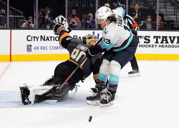 Robin Lehner of the Vegas Golden Knights makes the first period save on Brandon Tanev of the Seattle Kraken during the first period of the Kraken's...