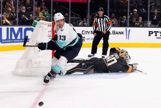 Robin Lehner of the Vegas Golden Knights makes the first period save on Brandon Tanev of the Seattle Kraken during the first period of the Kraken's...