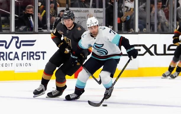 Jordan Eberle of the Seattle Kraken skates against Pavel Dorofeyev of the Vegas Golden Knights who was appearing in his first NHL game during the...