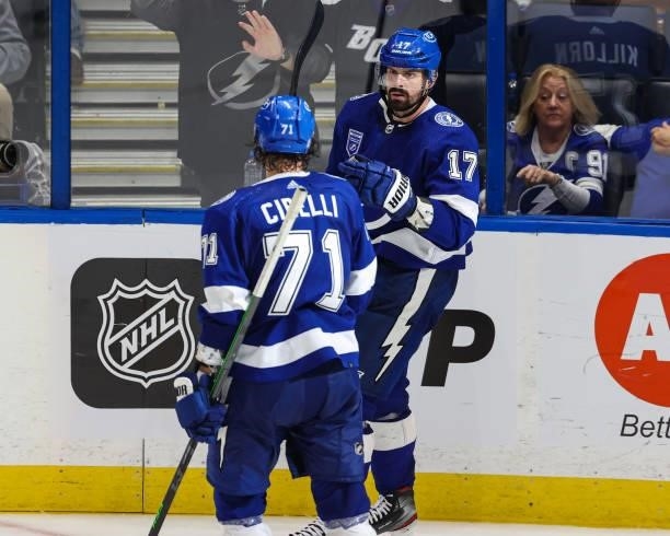 Anthony Cirelli and Alex Killorn of the Tampa Bay Lightning celebrate a goal against the Pittsburgh Penguins at Amalie Arena on October 12, 2021 in...
