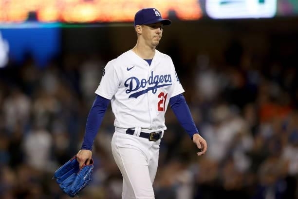 Walker Buehler of the Los Angeles Dodgers leaves the game against the San Francisco Giants during the fifth inning in game 4 of the National League...
