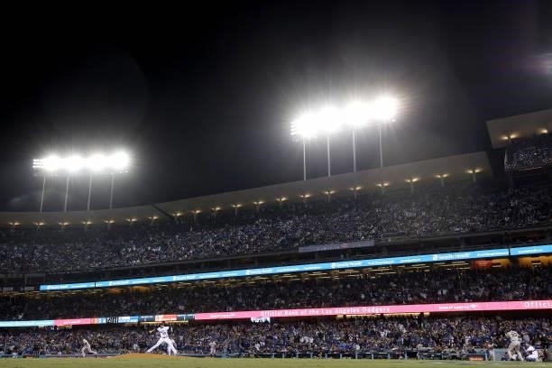 Blake Treinen of the Los Angeles Dodgers pitches against Darin Ruf of the San Francisco Giants during the seventh inning in game 4 of the National...