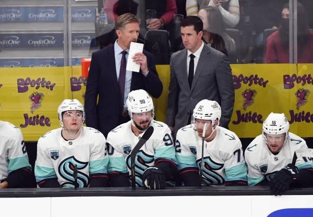 Head coach Dave Hakstol and assistant coach Paul McFarland of the Seattle Kraken work the bench against the Vegas Golden Knights during the first...