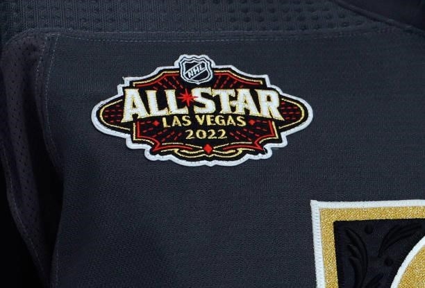 Robin Lehner of the Vegas Golden Knights wears a 2022 NHL All-Star logo patch in the third period of the Seattle Kraken's inaugural regular-season...