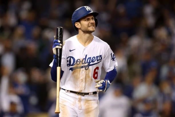 Trea Turner of the Los Angeles Dodgers reacts after his pop fly out against the San Francisco Giants during the eighth inning in game 4 of the...