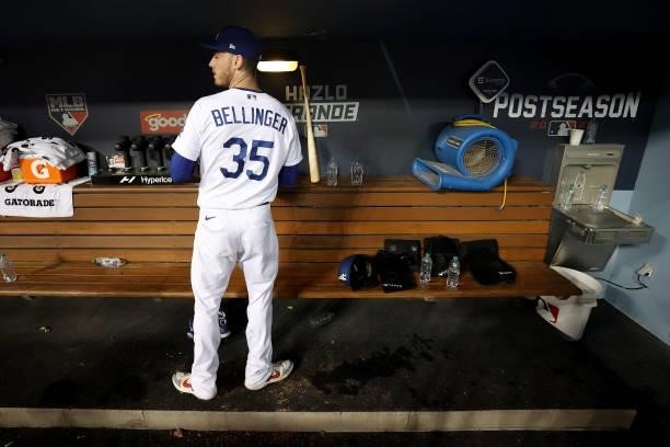 Cody Bellinger of the Los Angeles Dodgers walks in the dugout after beating the San Francisco Giants 7-2 in game 4 of the National League Division...