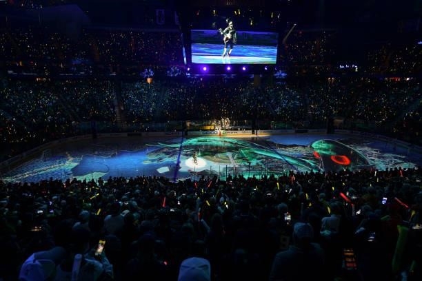 An image of a kraken is projected on the ice during a pregame show before the Seattle Kraken's inaugural regular-season game against the Vegas Golden...