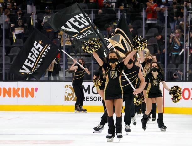 Members of the Knights Guard celebrate on the ice after the Vegas Golden Knights' 4-3 victory over the Seattle Kraken in the Kraken's inaugural...