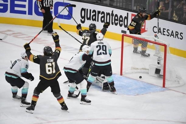 Mark Stone, Max Pacioretty, and Chandler Stephenson of the Vegas Golden Knights celebrate Pacioretty's goal against the Seattle Kraken during the...