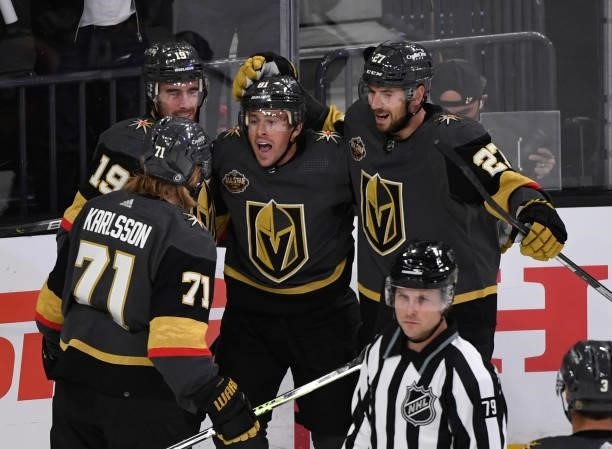 William Karlsson, Reilly Smith, Jonathan Marchessault, and Shea Theodore of the Vegas Golden Knights celebrate Marchessault's goal against the...