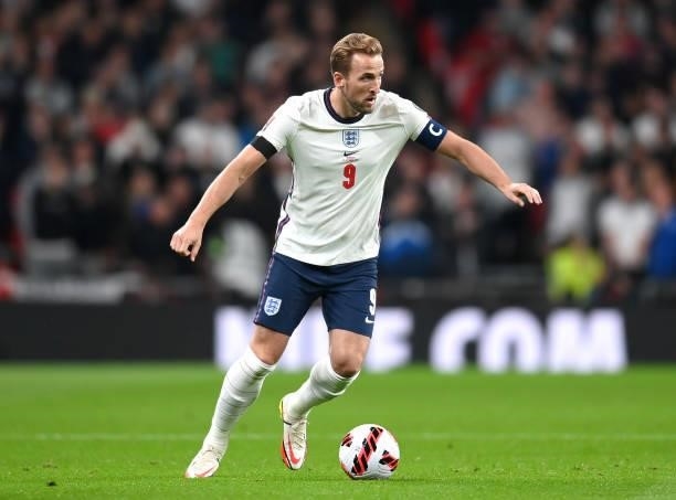 Harry Kane of England runs with the ball during the 2022 FIFA World Cup Qualifier match between England and Hungary at Wembley Stadium on October 12,...