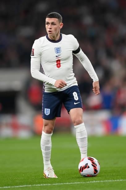 Phil Foden of England runs with the ball during the 2022 FIFA World Cup Qualifier match between England and Hungary at Wembley Stadium on October 12,...