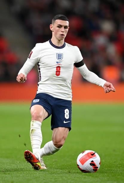 Phil Foden of England runs with the ball during the 2022 FIFA World Cup Qualifier match between England and Hungary at Wembley Stadium on October 12,...