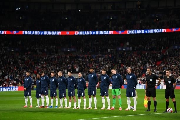 Players line up prior to the 2022 FIFA World Cup Qualifier match between England and Hungary at Wembley Stadium on October 12, 2021 in London,...