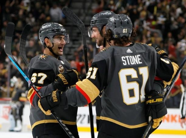 Max Pacioretty, Nicolas Hague and Mark Stone of the Vegas Golden Knights celebrate after Hague and Stone assisted Pacioretty on a second-period goal...