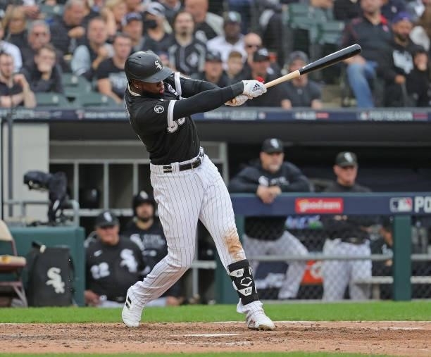 Luis Robert of the Chicago White Sox bats against the Houston Astros at Guaranteed Rate Field on October 12, 2021 in Chicago, Illinois. The Astros...