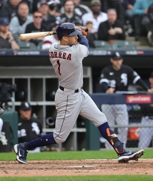 Carlos Correa of the Houston Astros bats against the Chicago White Sox at Guaranteed Rate Field on October 12, 2021 in Chicago, Illinois. The Astros...