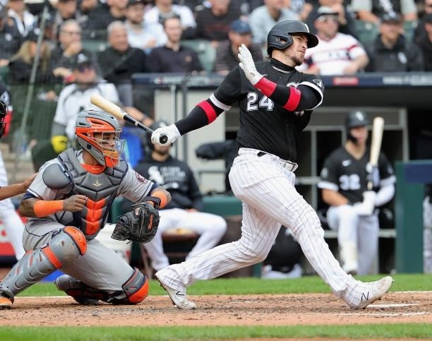 Yasmani Grandal of the Chicago White Sox bats against the Houston Astros at Guaranteed Rate Field on October 12, 2021 in Chicago, Illinois. The...
