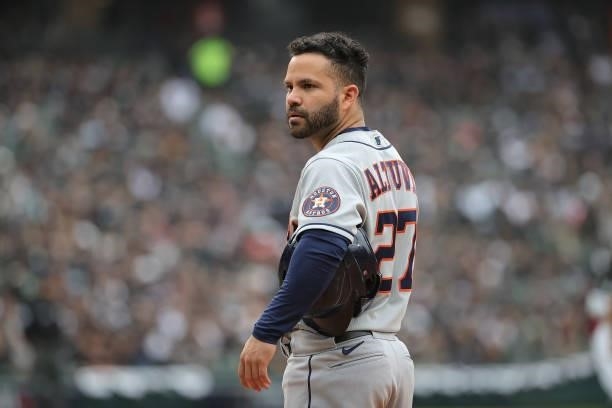 Jose Altuve of the Houston Astros waits at first base during a pitching change by the Chicago White Sox at Guaranteed Rate Field on October 12, 2021...