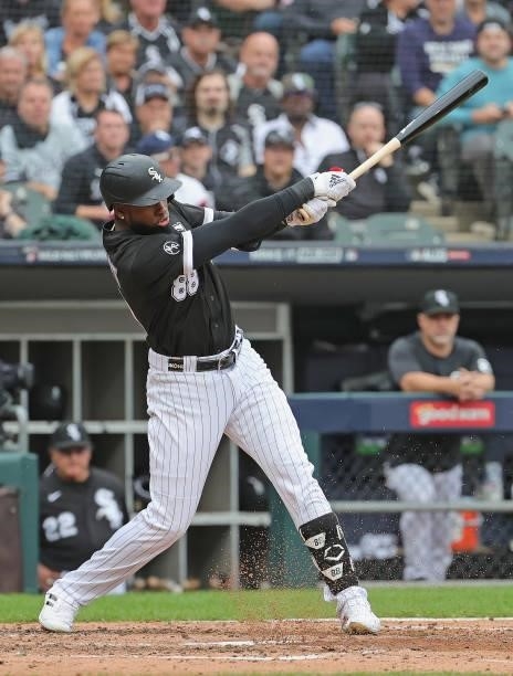 Luis Robert of the Chicago White Sox bats against the Houston Astros at Guaranteed Rate Field on October 12, 2021 in Chicago, Illinois. The Astros...