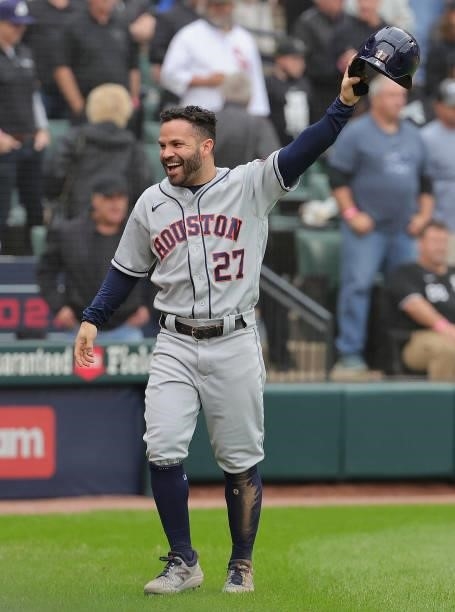 Jose Altuve of the Houston Astros celebrates after scoring a run against the Chicago White Sox at Guaranteed Rate Field on October 12, 2021 in...