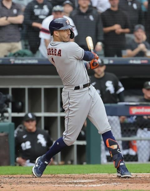 Carlos Correa of the Houston Astros bats against the Chicago White Sox at Guaranteed Rate Field on October 12, 2021 in Chicago, Illinois. The Astros...