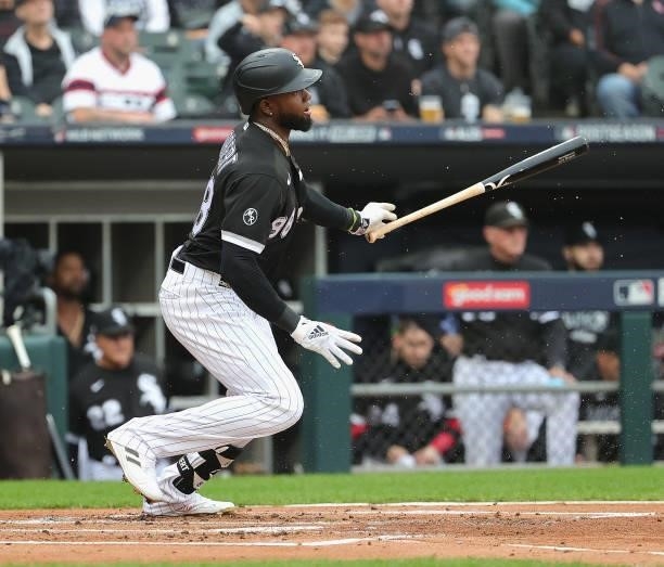 Luis Robert of the Chicago White Sox runs after batting against the Houston Astros at Guaranteed Rate Field on October 12, 2021 in Chicago, Illinois....