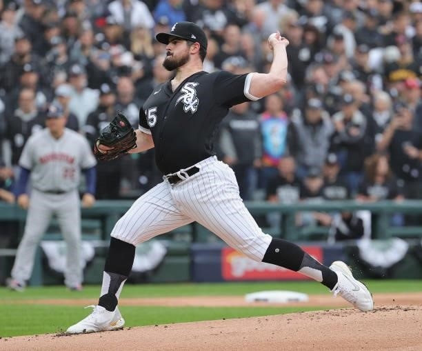 Starting pitcher Carlos Rodon of the Chicago White Sox delivers the ball against the Houston Astros at Guaranteed Rate Field on October 12, 2021 in...