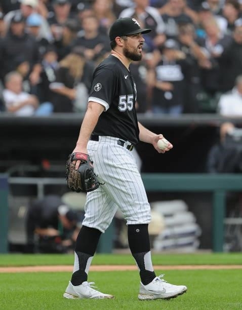 Starting pitcher Carlos Rodon of the Chicago White Sox walks to the mound against the Houston Astros at Guaranteed Rate Field on October 12, 2021 in...