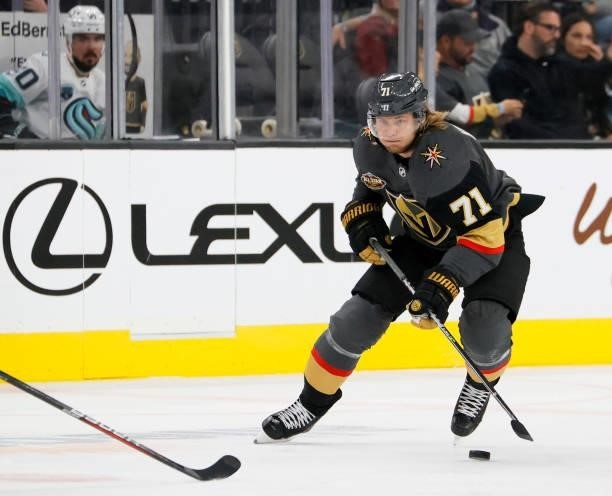 William Karlsson of the Vegas Golden Knights skates with the puck against the Seattle Kraken in the second period of the Kraken's inaugural...