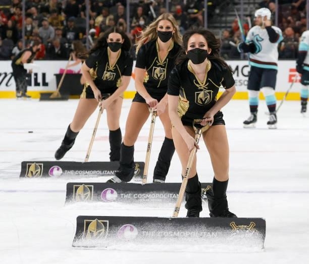 Members of the Knights Guard clean the ice during the Vegas Golden Knights' game against the Seattle Kraken during the Kraken's inaugural...