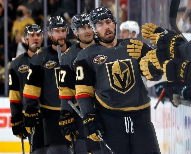 Chandler Stephenson of the Vegas Golden Knights celebrates with teammates on the bench after his goal against the Seattle Kraken at 8:33 of the third...