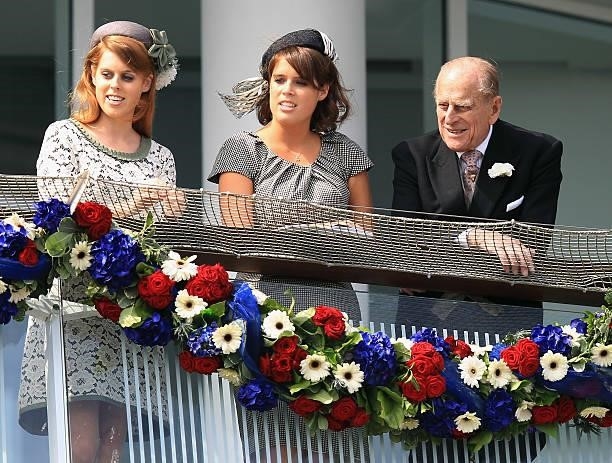 Princess Beatrice of York , Princess Eugenie of York and Prince Philip, Duke of Edinburgh watch the action from the royal balcony during the Investec...