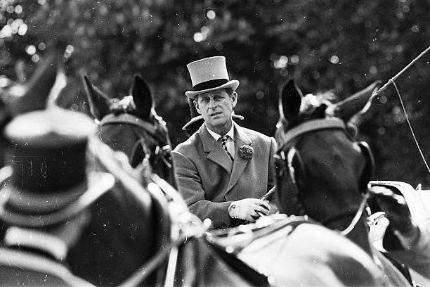 Prince Philip, the Duke Of Edinburgh driving a carriage at the Royal Windsor Horse Show, 9th May 1974.