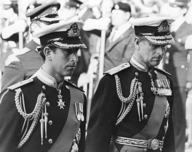 Charles, Prince of Wales and Prince Philip, Duke of Edinburgh attending the funeral of Earl Louis Mountbatten in full Naval regalia, London, 9th...