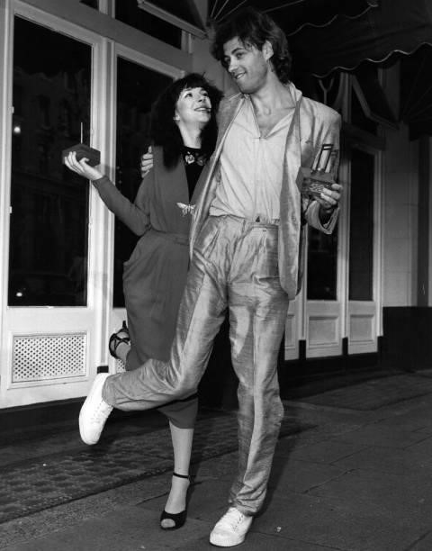 British pop singer Kate Bush and Bob Geldof, lead singer of the group the Boomtown Rats, celebrate their victories after the Melody Maker Reader's...