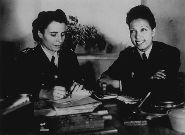 American born entertainer, dancer and singer Josephine Baker , right, as a volunteer in the Free French Women's Air Auxiliary.