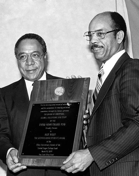 Author Alex Haley receives an award from the United Negro College Fund, 1977.