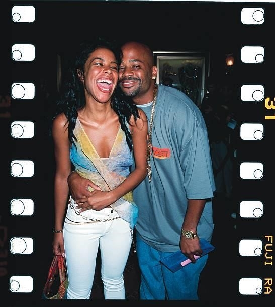 Singer Aaliyah w. Her boyfriend, Roc-a-Fella Records CEO Damon Dash .