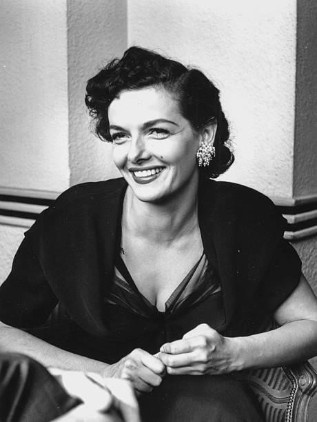 Portrait of actress Jane Russell smiling, pictured at a press reception as she prepares to make her stage debut at the Prince Charles Theatre,...
