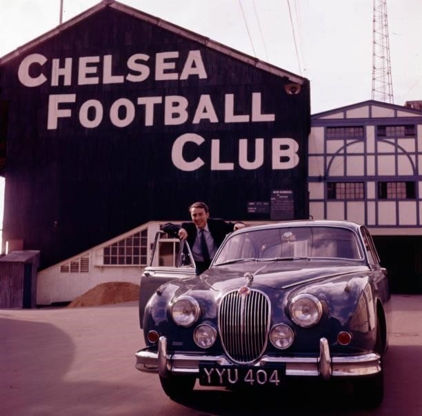 England and Tottenham Hotspur footballer Jimmy Greaves posed at the door of his Jaguar Mark 2 car outside Stamford Bridge, Chelsea's football ground...