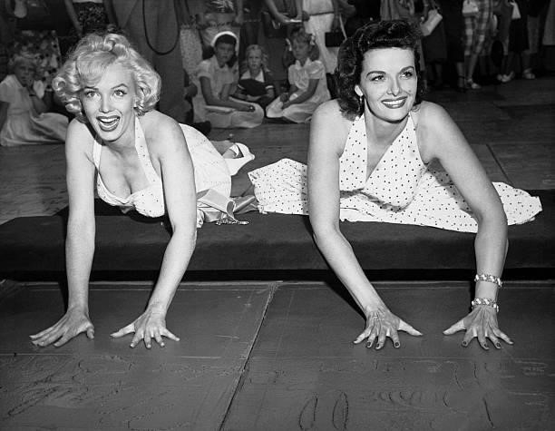 Glamour queens Marilyn Monroe and Jane Russell, needless to say, made Hollywood's hall of fame at Grauman's Chinese Theatre while extra police kept...