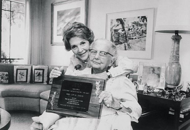 The first lady's mother, Edith Davis, proudly displays her Arizona Lifetime Achievement Award, from the Association of Retarded Children . Mrs....