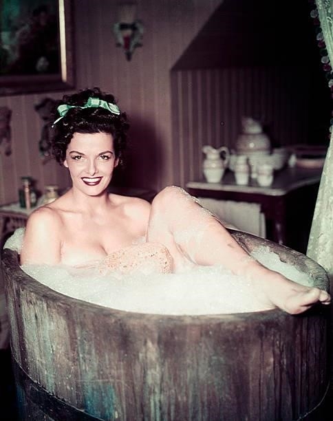 Rosalind Russell in bubble bath in film 'Son of Paleface', 1952.