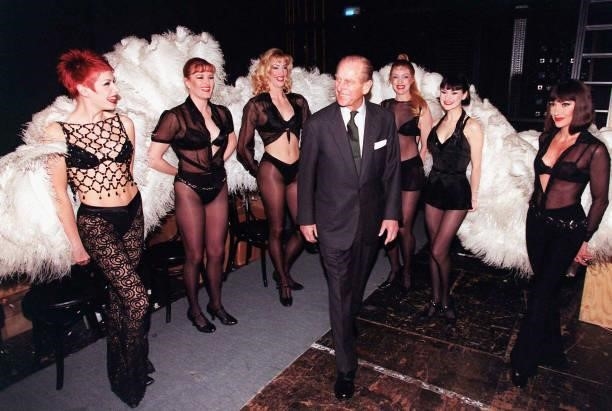 Prince Philip, the Duke of Edinburgh meets members of the cast of Chicago during a visit to the Adelphi Theatre in this March 4, 1999 file photo in...
