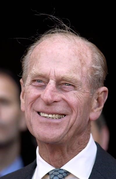 Prince Philip At Harewood House Smiling To Reveal A Gold Tooth While Watching A Pageant.